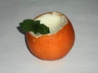 naranja rellena de crema con su jugo natural