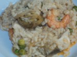 arroz inesperado con gambas, pollo y alcachofas